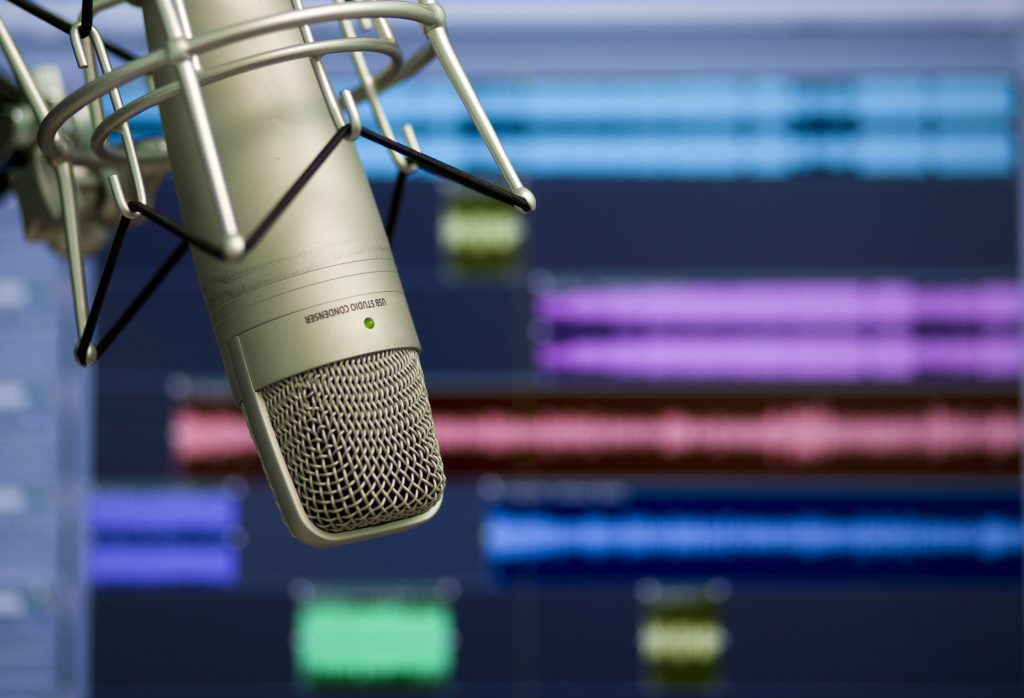 Recording microphone being used with digital editing software (in the background)